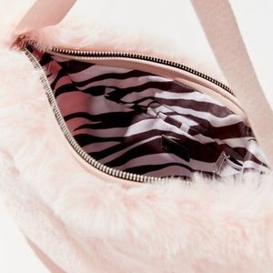 Urban Outfitters faux fur pink baguette purse
